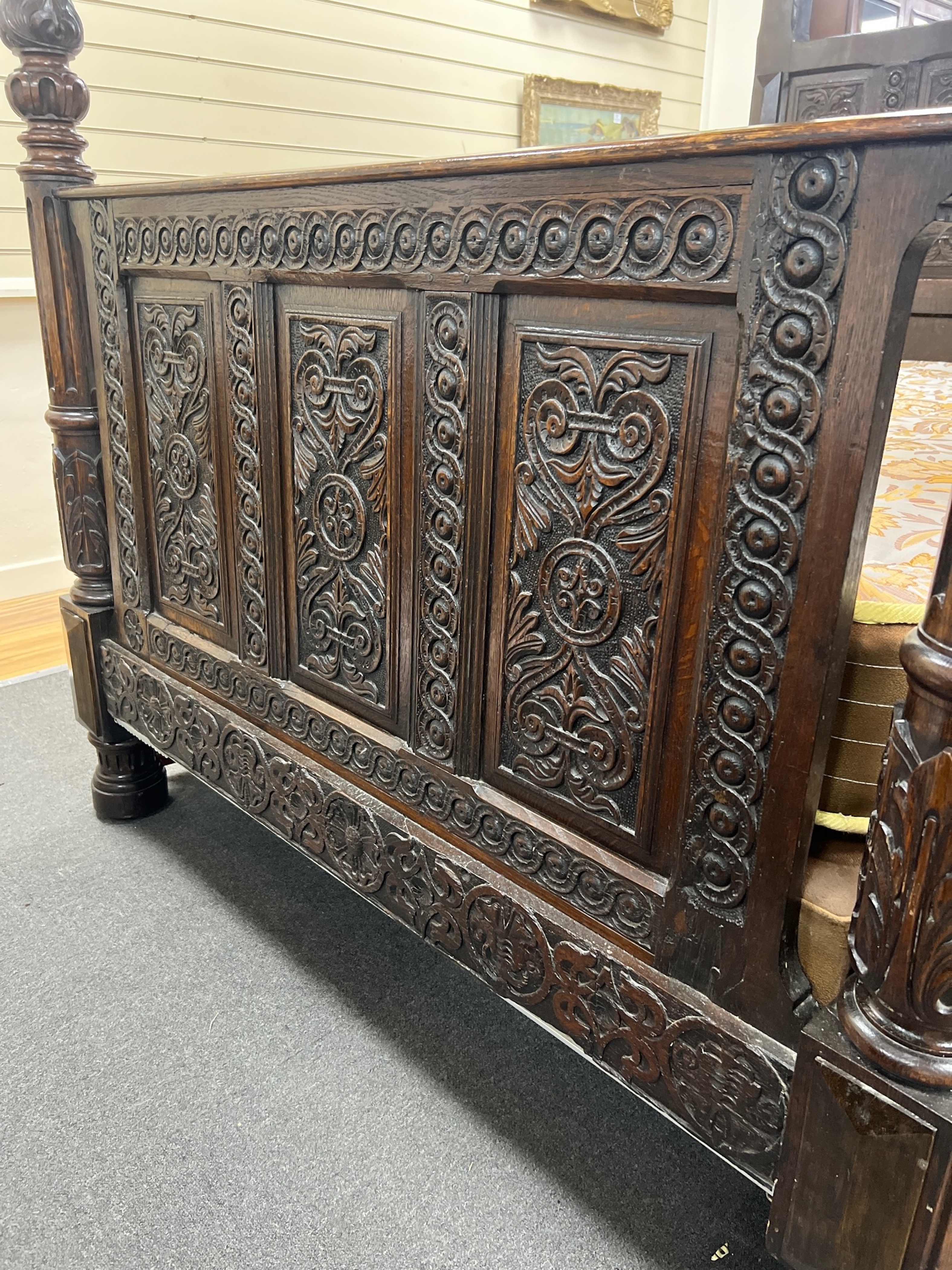 A 17th century and later oak full tester bedstead